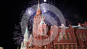 Celebratory colorful fireworks and State Historical Museum. Moscow, Russia time lapse, with zoom