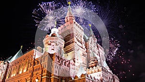 Celebratory colorful fireworks and State Historical Museum. Moscow, Russia time lapse, with zoom