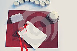 Celebratory decorated table with paper card and candles