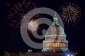 Celebratory fireworks of Independence day United States Capitol building in Washington DC, on the background