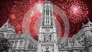 Celebratory fireworks over the Great gothic church of Saint Germain l´Auxerrois, Paris, France