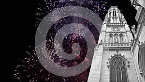 Celebratory fireworks over the Great gothic church of Saint Germain l´Auxerrois, Paris, France