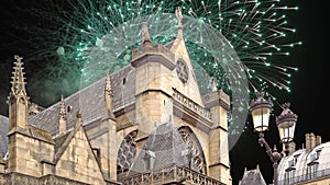 Celebratory fireworks over the Great gothic church of Saint Germain l´Auxerrois, Paris, France