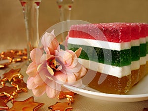 Celebratory table (Color Jelly cake and flower on plate) photo