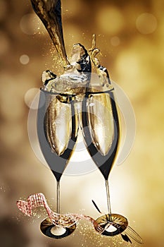 Celebratory toast with champagne glasses. New Year`s Eve background.