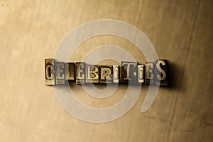 CELEBRITIES - close-up of grungy vintage typeset word on metal backdrop photo