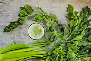 Celery Juice, Healthy Drink, bunch of celery on a wooden background