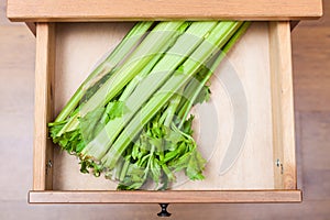 Celery stalks in open drawer