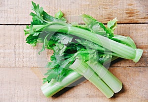 Celery sticks and leaf fresh vegetable - Bunch of celery stalk on wooden background