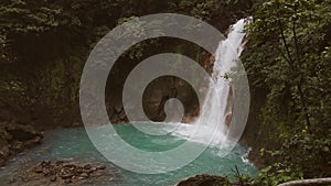 Celeste river waterfall and pond, Tenorio volcano, Costa Rica