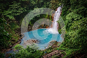 Celestial blue waterfall in volcan tenorio national park costa rica