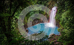 Celestial blue waterfall in volcan tenorio national park costa rica