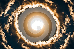 Celestial Ring: A Stunning Sun Encircled by a Dramatic Cloud Formation