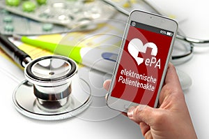 cell or mobile phone with the text ePA elektronische Patientenakte, electronic health records