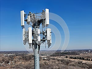 Cell phone antenna array mounted on top of a monopole tower