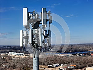 Cell phone antenna array mounted on top of a monopole tower