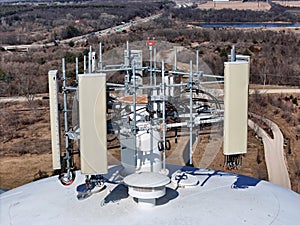 Cell phone antenna array mounted on top of a water tower