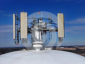 Cell phone antenna array mounted on top of a water tower