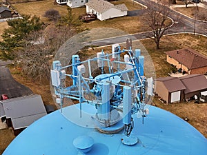 Cell phone antenna array mounted on top of a water tower