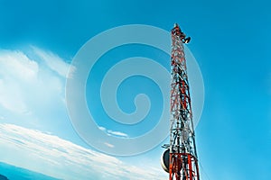 Cell phone antenna and communication towers with blue sky