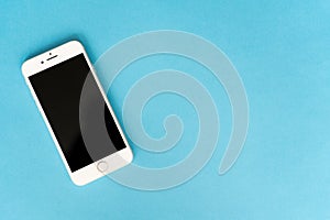 Cell phone in blue background photo