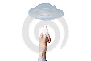 Cell phone charger in a man`s hand. On a white background. .Charger for mobile phone in hand on white background isolation