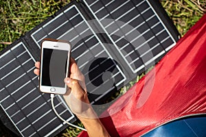 Cell phone charging with a solar charger