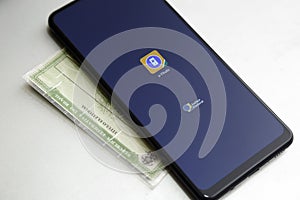 Cell phone screen with e-titulo application