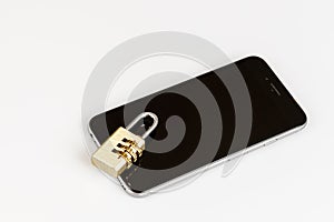 Cell phone security - lock and phone on white