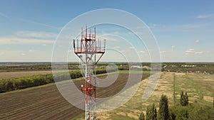 Cell site of telephone tower with 5G base station transceiver