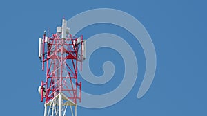 Cell site of telephone tower with 6g base station transceiver. Tower antenna telecommunication cell phone.