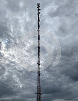 Cell tower against a gloomy sky