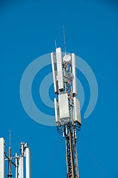 Cell tower and clear blue sky