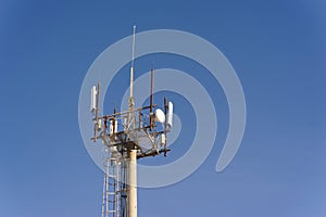 The cell tower operator on the blue sky