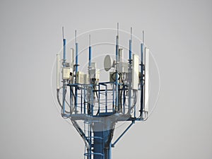 Cell tower radio mast with installed electronic equipment for cellular communication and internet access closeup