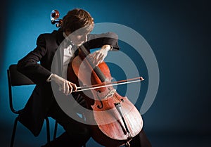 Cellist playing on cello