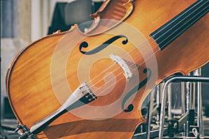 Cello classical instrument on an empty stage.