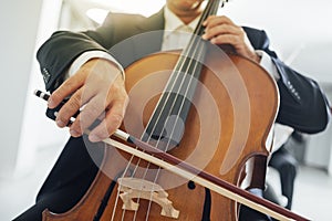 Cello player's hands close up