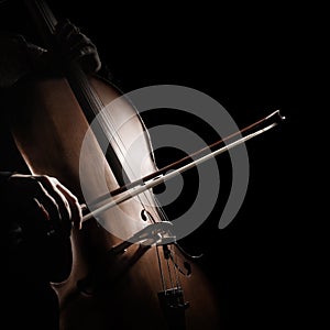 Cello player violoncello player with bow photo