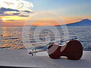 Cello at a sunset