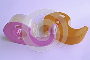 Cello tape dispensers on a white background photo