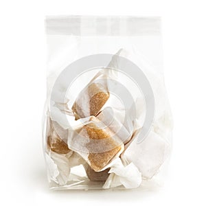 cellophane packet of wrapped caramel toffees.