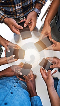 Cellphone, hands and team of people in circle networking online for email, social media or internet. Technology, typing