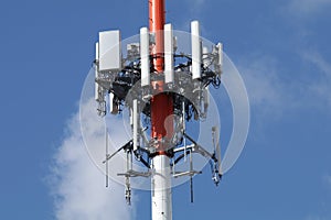 Cellphone tower with a blue sky background