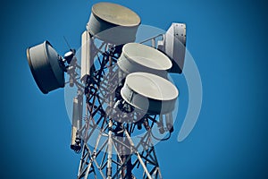 Cellphone tower with microwave dish stock photograph