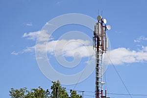 Cellular antenna against blue sky. Concept of modern business communication