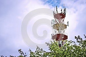 Cellular antenna against blue sky. Concept of modern business communication