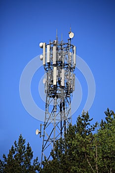 Cellular antenna on blue sky background