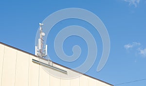 Cellular antenna on blue sky.Radio and mobile communication
