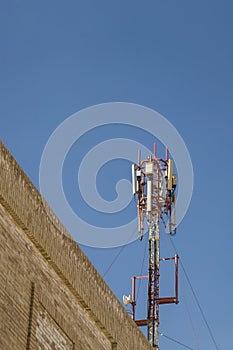 Cellular antenna. Communication on a building roof top